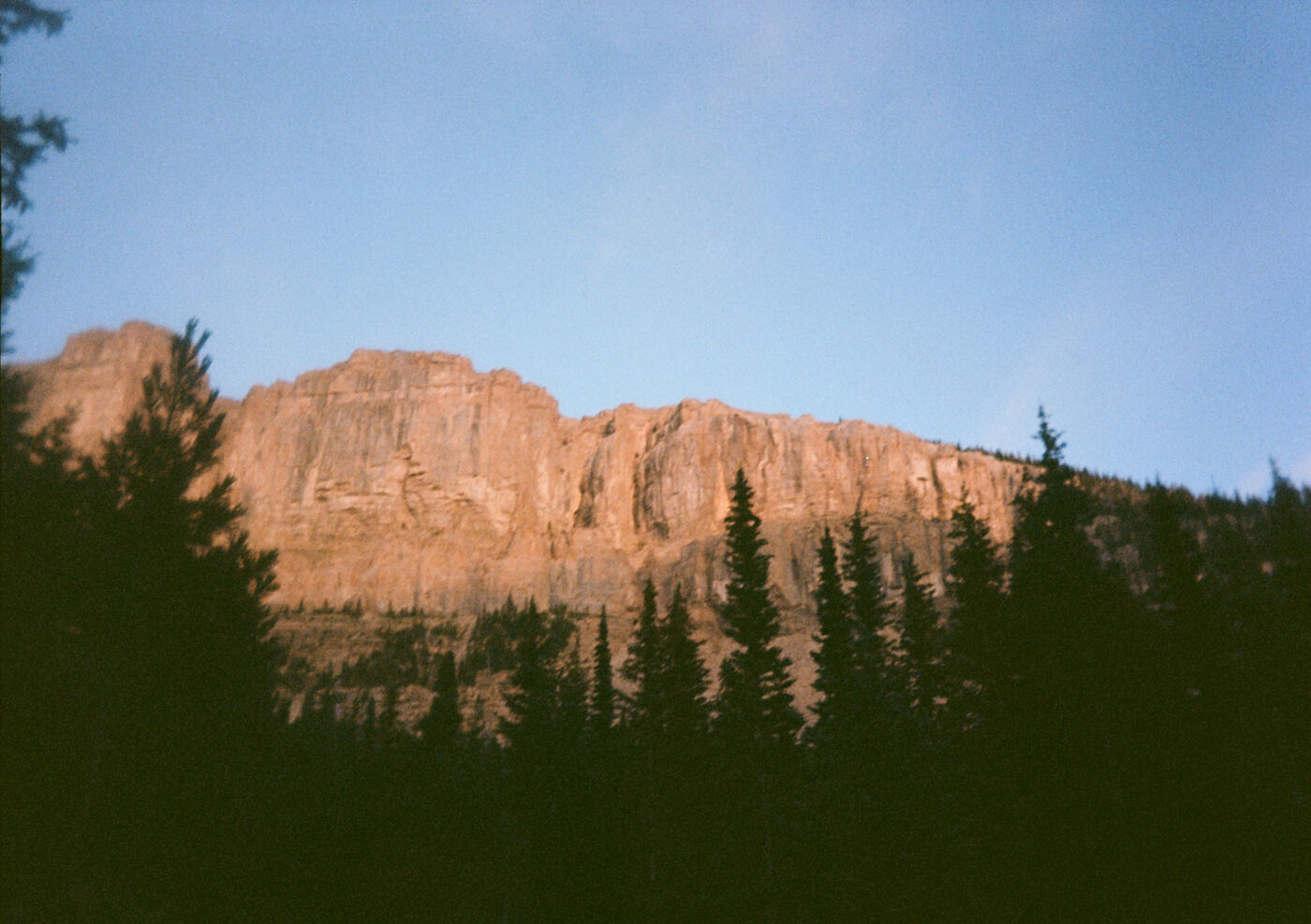 At the end of the summer of '25 me and Maria went to the scapegoat for a few days. This photo was taken right after getting lost in the middle of a drainage in the wilderness. It was approaching dark, and we had been hiking for days completely alone. We went to check out a lake and saw huge bear tracks. We decided to push on and find a better place to camp, but we couldn't find the trail after a few hours. As the light was almost gone, we decided to split up, and I looked for the trail. I ditched my pack to move faster and set out toward the wall of the ravine. I found the trail shortly thereafter.