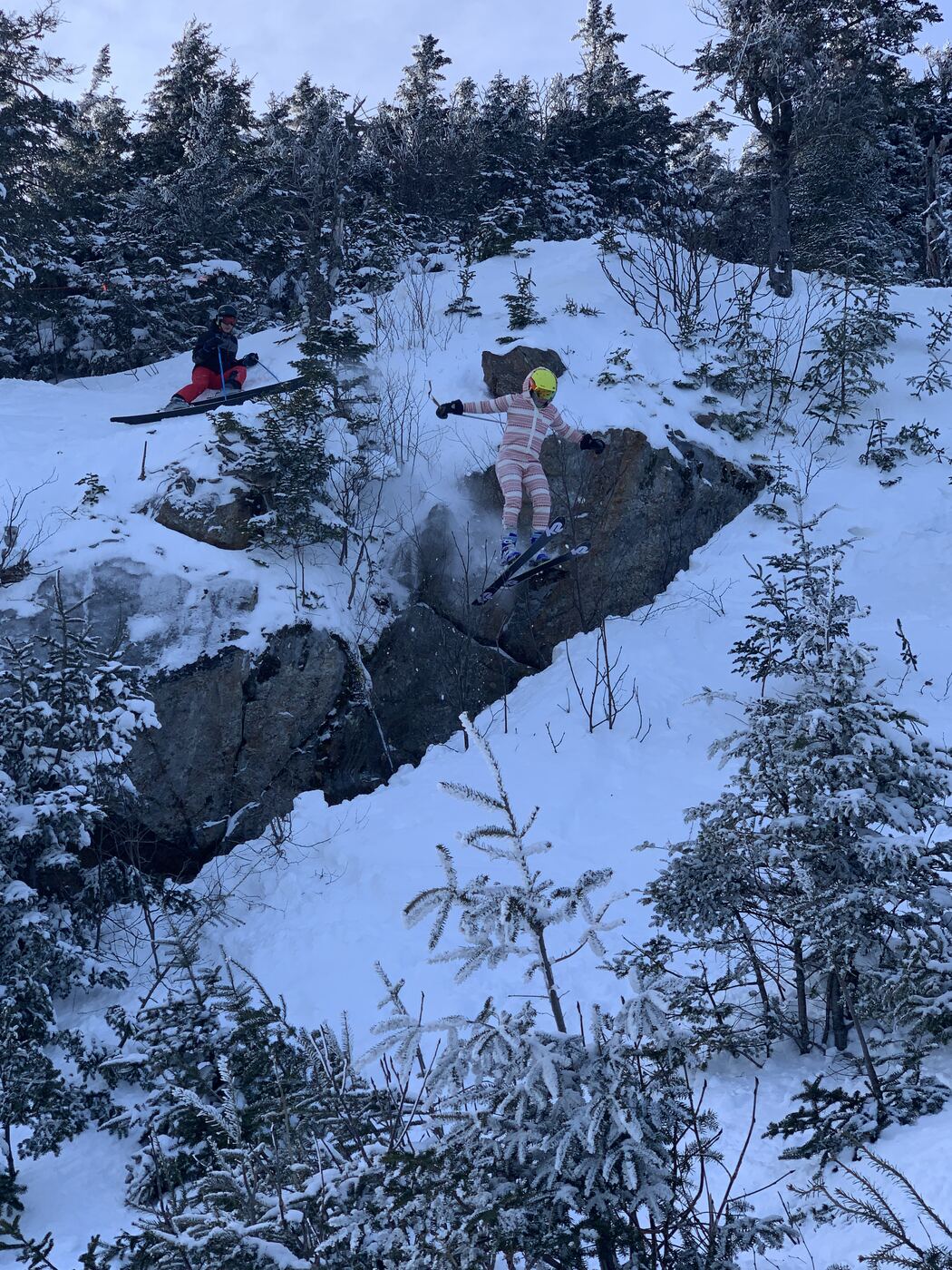 Clad in a onesie, Seamus jumps off a cliff with Joaquin watching from above. We joked about doing this naked.