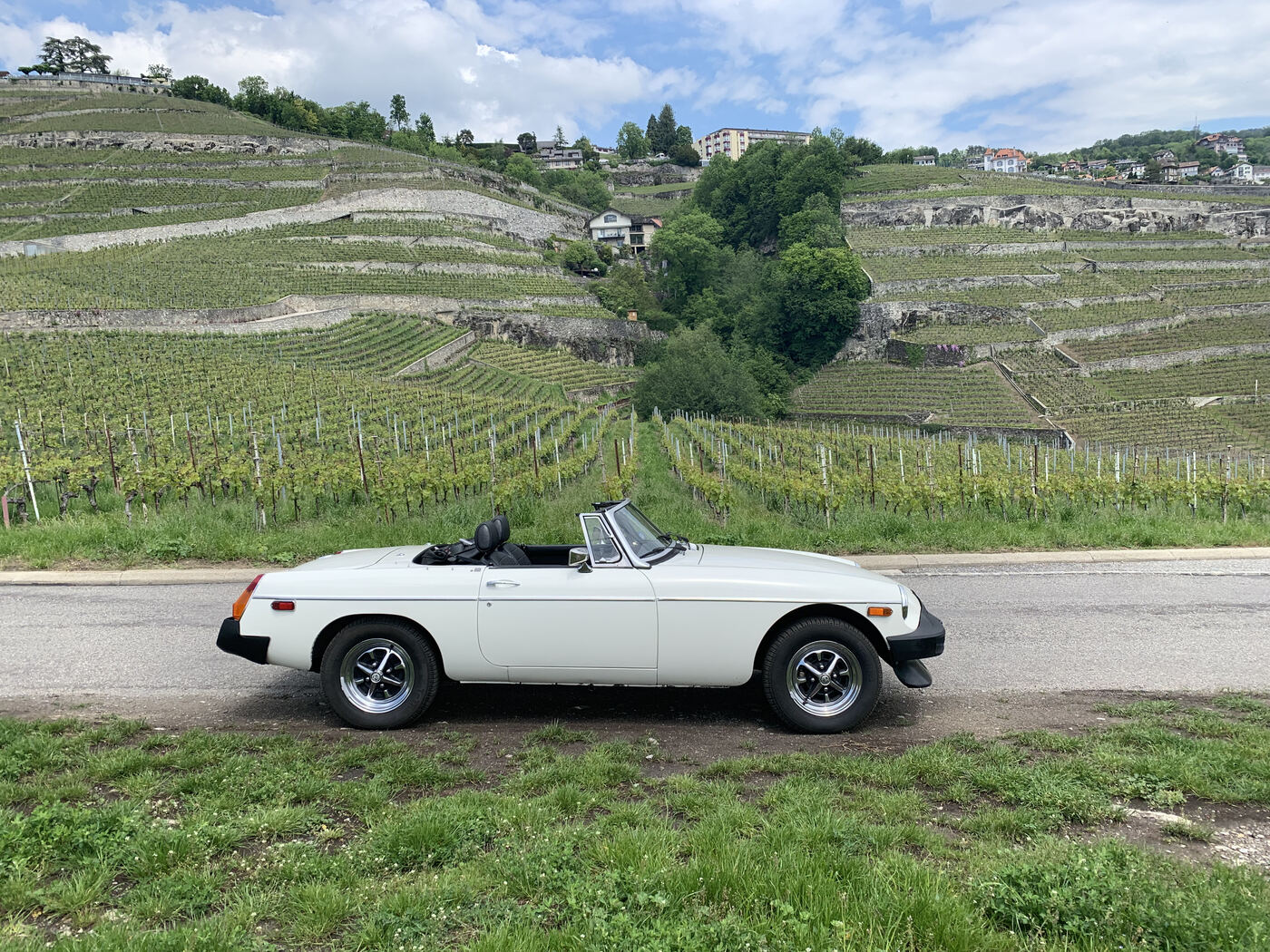 My host father's car. Last week, he took me for a drive in it. We got ice cream. we were close, him and I.